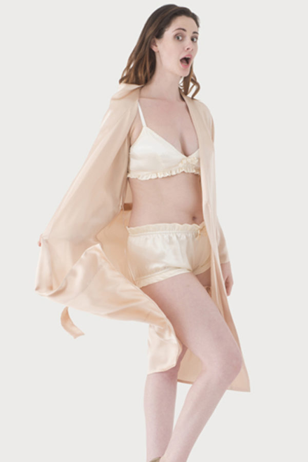 A lady wearing silk french knickers a bra and a robe - The Little Wedding Company
