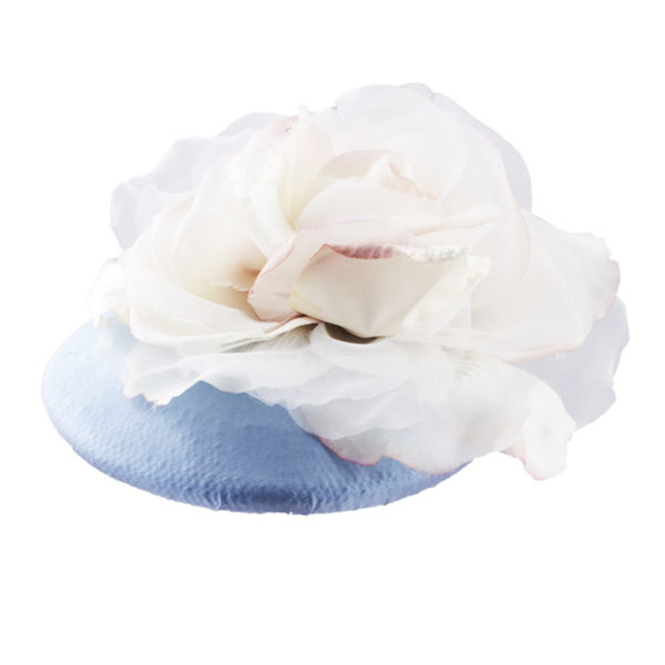 Small pale blue taffeta round hat with a large ivory rose on the top - The Little Wedding Company