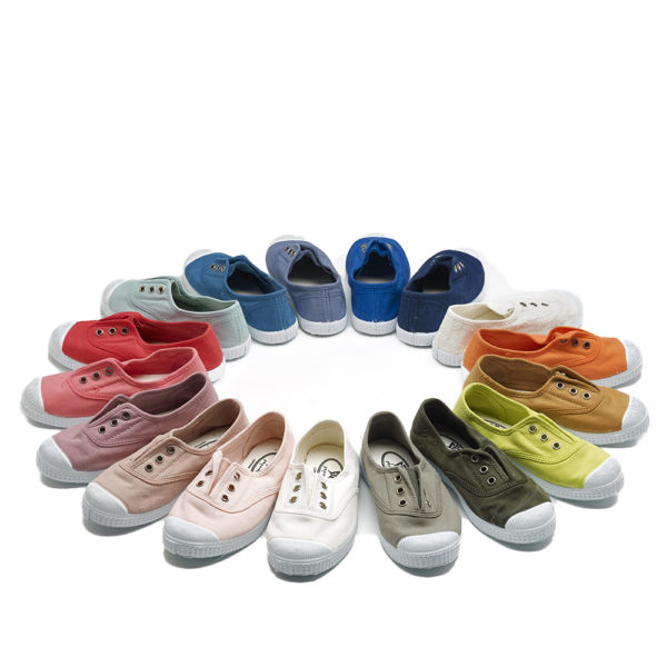 A circle of different coloured canvas pumps - The Little Wedding Company