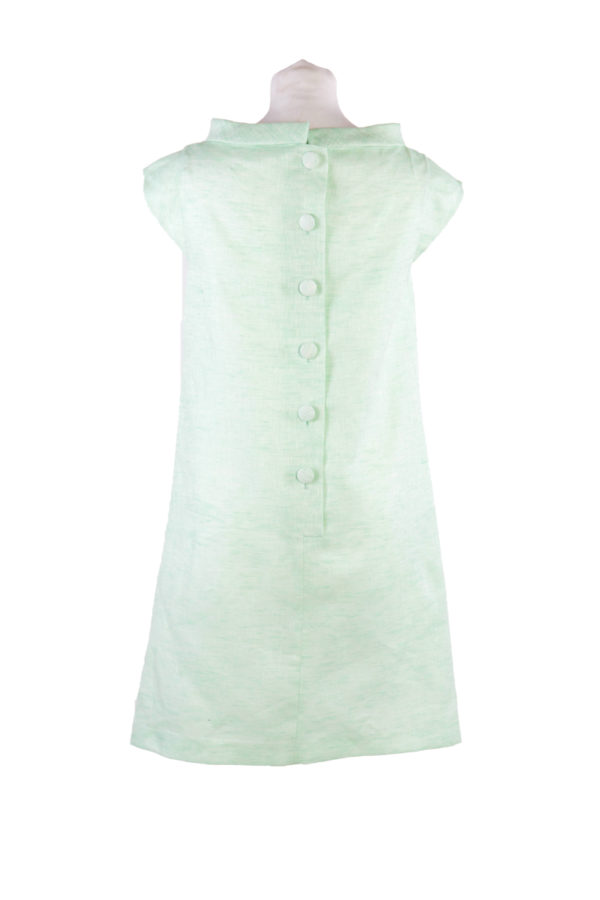 A short green linen dress with boat neck and button back - The Little Wedding Company